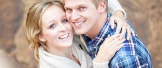 A girl and a guy hugging. They are happy