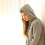 Sad girl in a hood