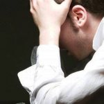 Man and bottle of alcohol